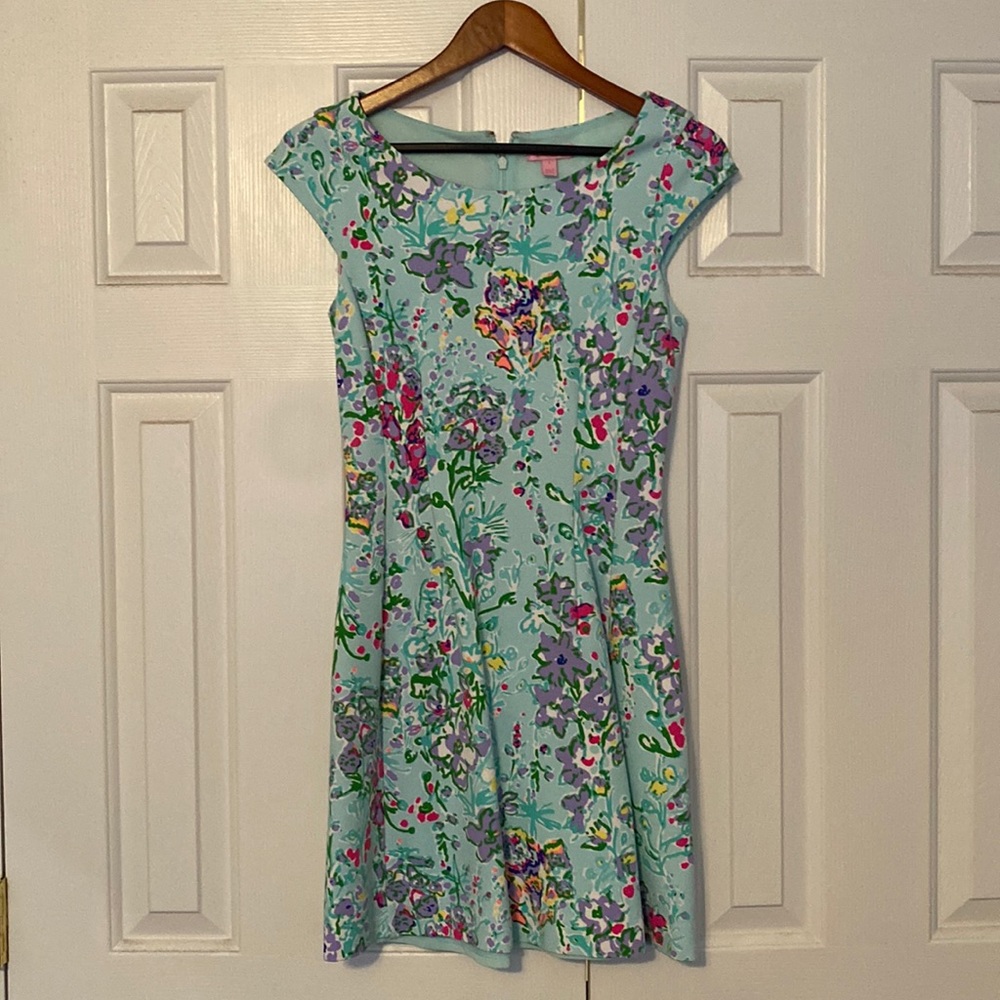 Light blue floral Lilly Pulitzer dress with belt.